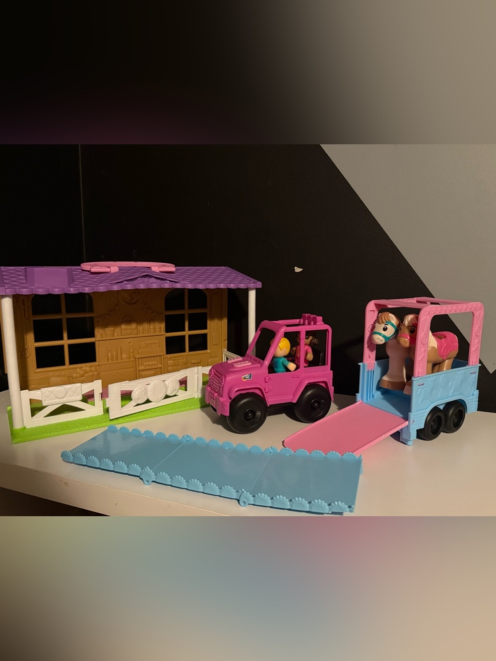 Pony ranch playset with barn, tractor, horse trailer, two ponies, two people
